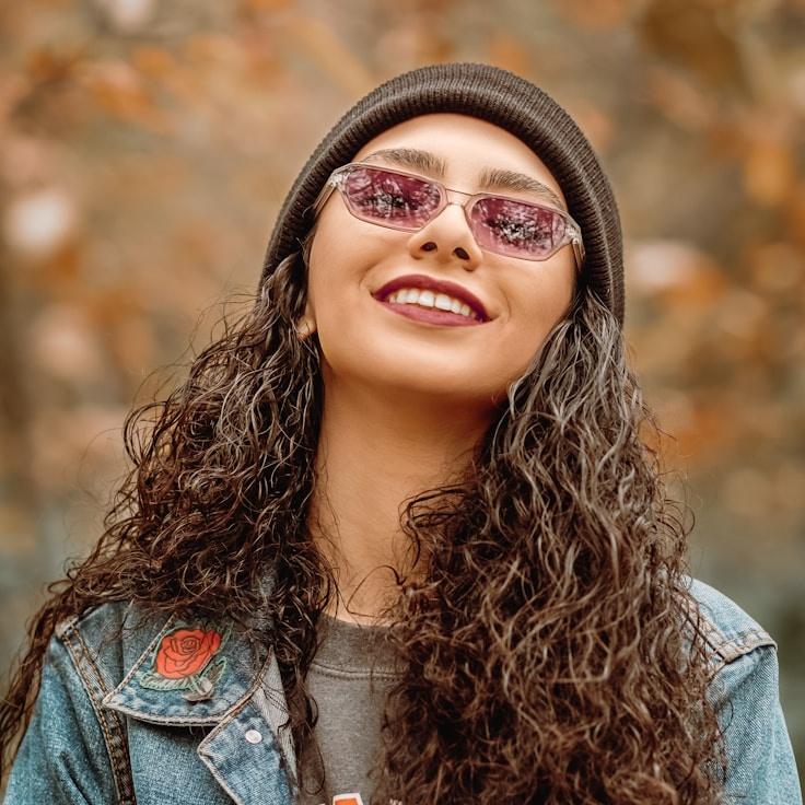 Avery Chen, Lead Design Curator at SilverNestChest, reviewing corporate floral arrangements